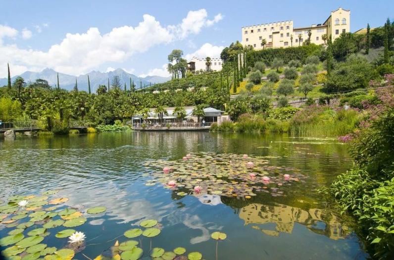 Nestled in fields and vineyards in the mountainside panorama of South Tyrol.